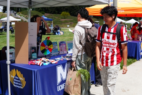 Student at Earth Day Tabling